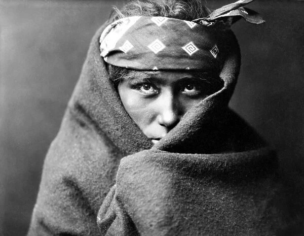 NAVAJO BOY, c1904. Navajo boy identified as the son of Many Goats. Photograph by Edward Curtis, c1904