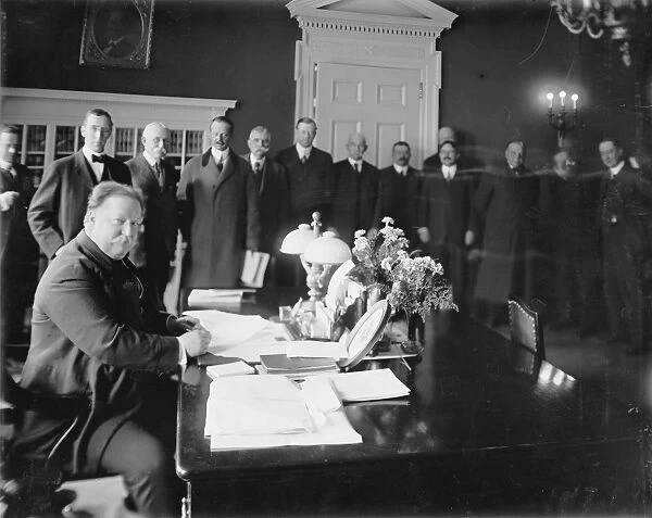 NEW MEXICO STATEHOOD, 1912. President William Howard Taft signing a bill granting