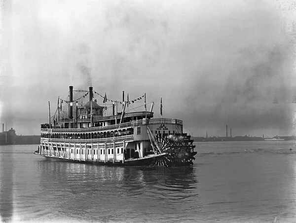 NEW ORLEANS: STEAMBOAT. A steamboat on the Mississippi River carrying tourists past New Orleans