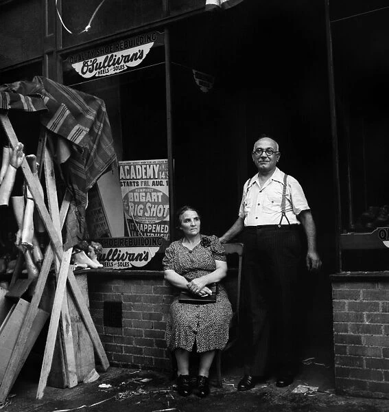 NEW YORK: LITTLE ITALY. An Italian shoemaker and his wife on Mott Street in Little Italy