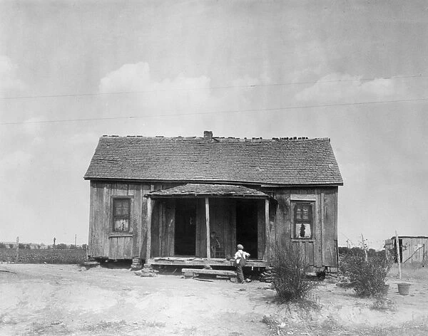 OKLAHOMA: DROUGHT, 1936. A tenant farm home in a drought area of Oklahoma. Photograph