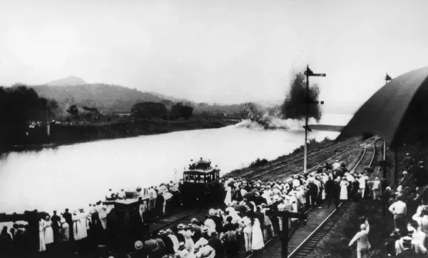 PANAMA CANAL: GAMBOA DIKE. U. S. President Woodrow Wilson remotely triggers the