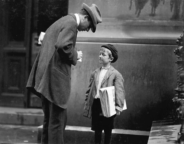 PHILADELPHIA: NEWSBOY, 1910. Michael McNeils, an eight year old newsboy in Philadelphia