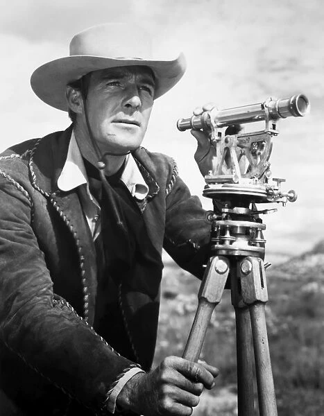RANDOLPH SCOTT (1898-1987). American film actor. In a scene from Western Union, 1941