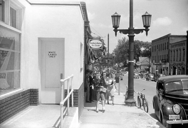 SEGREGATED ENTRANCE, 1940. Door marked white ladies only on a store in Durham, North Carolina