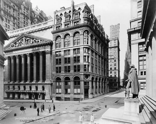 STOCK EXCHANGE, c1908. Exterior of the New York Stock Exchange. Federal Hall is seen at right. Photograph by Irving Underhill, c1908