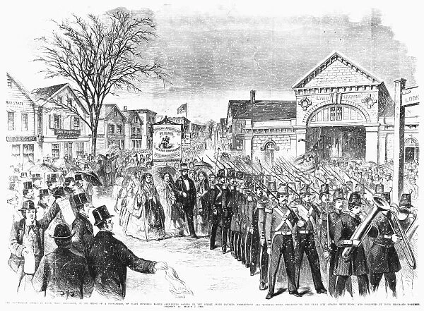 STRIKING WOMEN, 1860. Eight hundred striking women shoemakers of Lynn, Massachusetts, parading in a snowstorm behind the Lynn City Guards, 7 March 1860. Contemporary American wood engraving