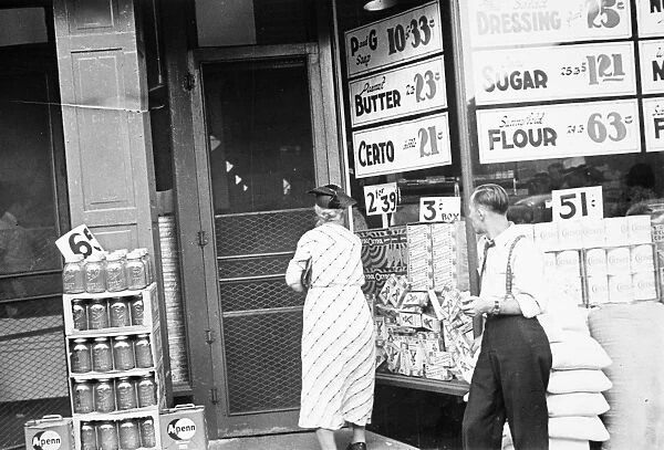 SUPERMARKET, 1938. Shoppers at a grocery store in Newark, Ohio. Photograph, 1938