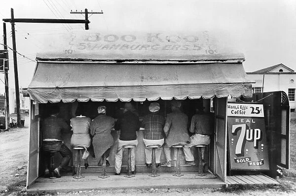 TEXAS: LUNCHEONETTE, 1939. An outdoor hamburger stand at Harlingen, Texas. Photograph by Russell Lee, February 1939