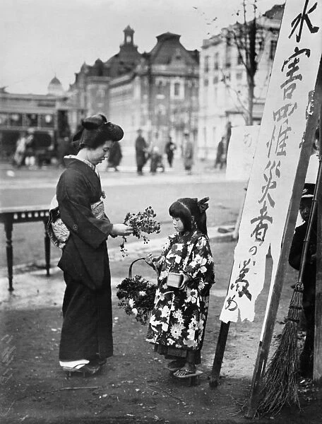 TOKYO, C1915. Selling artificial flowers in Tokyo, Japan. Photograph, c1915