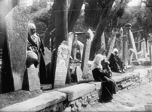 TURKEY: CEMETERY, c1910. Turkish women in a cemetery at Uskudar, Istanbul, Turkey