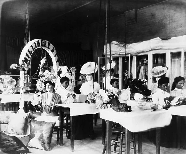 TUSKEGEE INSTITUTE, 1906. A millinery class