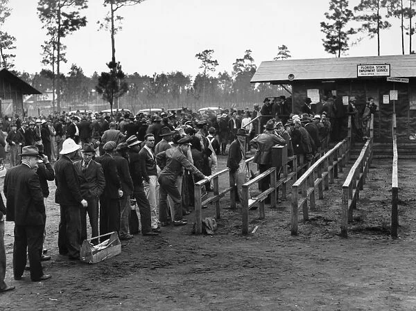 Unemployed carpenters and construction workers lined up outside the office of the State Employment Service in Starke, Florida. Photographed by Marion Post Wolcott, December 1940