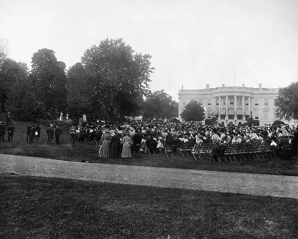 WHITE HOUSE: PLAY, 1908. An audience watching a Sylvan play performed on the White House lawn