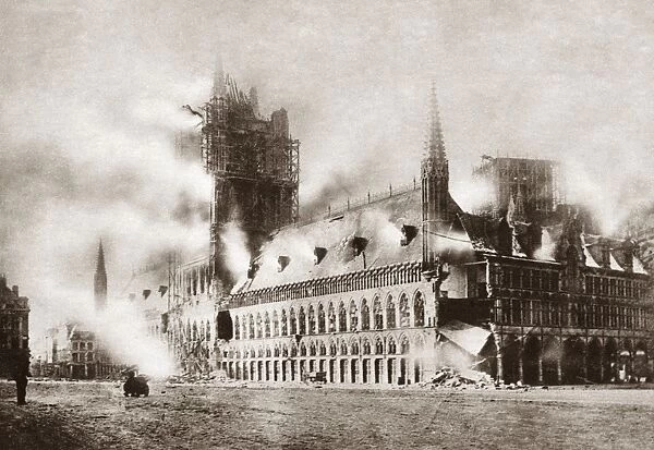 WORLD WAR I: YPRES. The Cloth Hall in Ypres, Flanders, set on fire by the invading