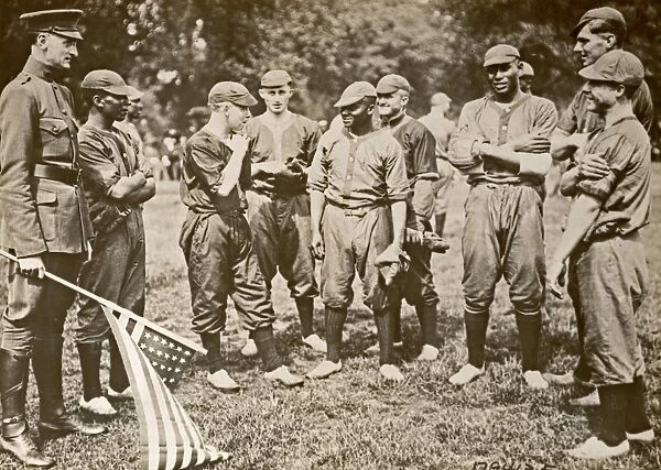 WWI: BASEBALL, 1918. American troops posing before a black vs