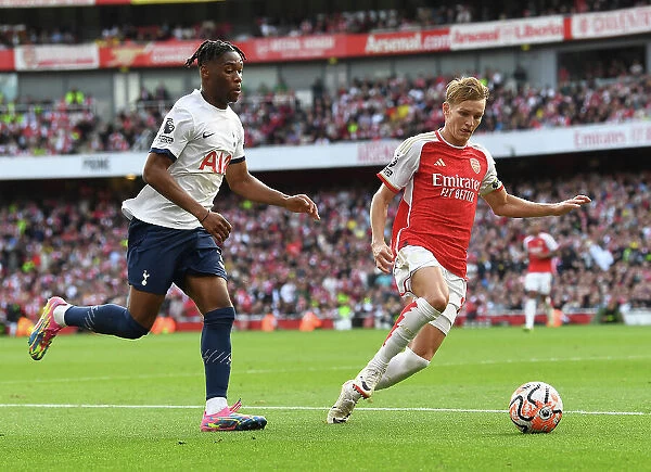 Arsenal vs. Tottenham Clash: Martin Odegaard vs. Destiny Udogie at Emirates Stadium (2023-24)