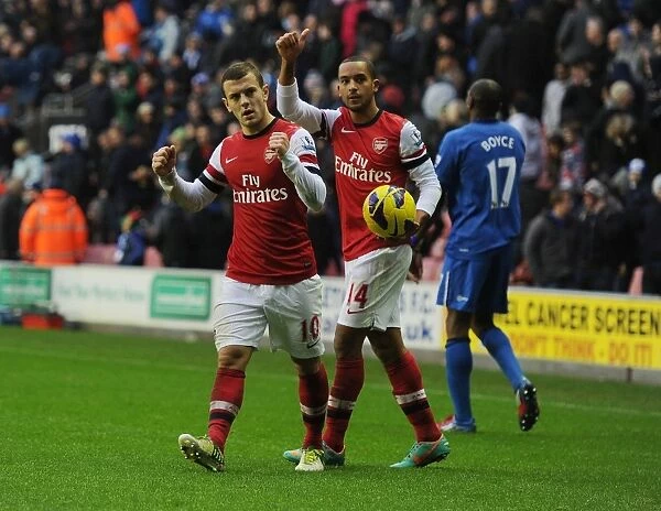Arsenal's Hard-Fought Victory over Wigan Athletic (2012-13): Jack Wilshere and Theo Walcott Celebrate