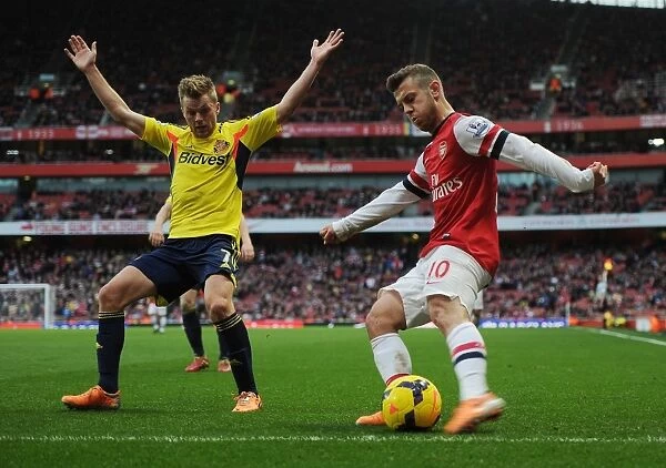 Arsenal's Jack Wilshere Skills Past Sunderland's Sebastian Larsson in 2013-14 Premier League Clash