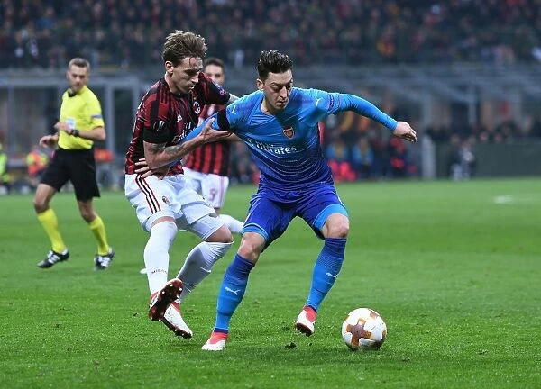 Mesut Ozil vs. Lucas Biglia: Battle in the Europa League - Arsenal vs. AC Milan
