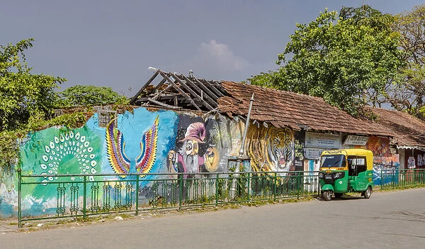 A mural on a delapidated building in Fort Kochi in Kerala, India