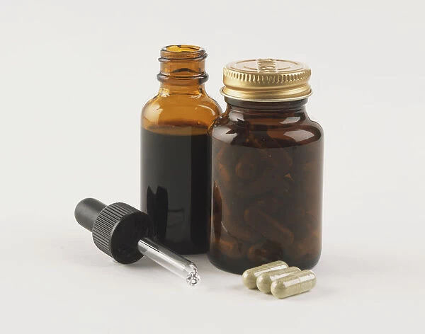 Two bottles containing Echinacea in liquid and capsule form