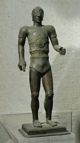 Bronze statuette of armored warrior