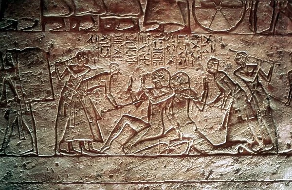 Capture of enemy soldiers by Egyptians. Limestone relief from Temple of Rameses II