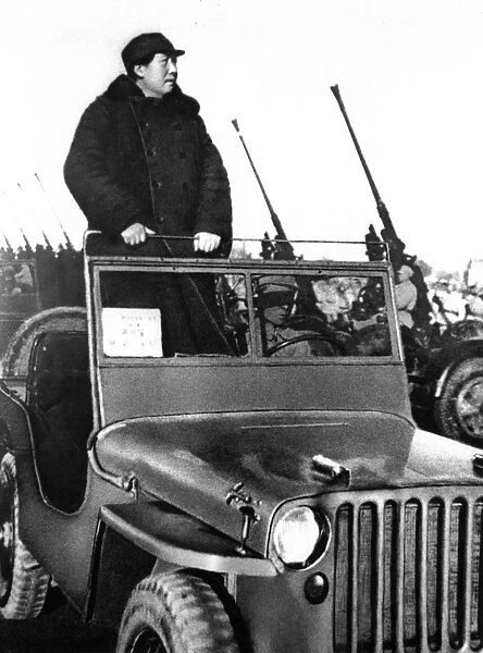 Chairman mao reviewing pla forces ay hsiyuan airfield on the outskirts of peking in march 1949