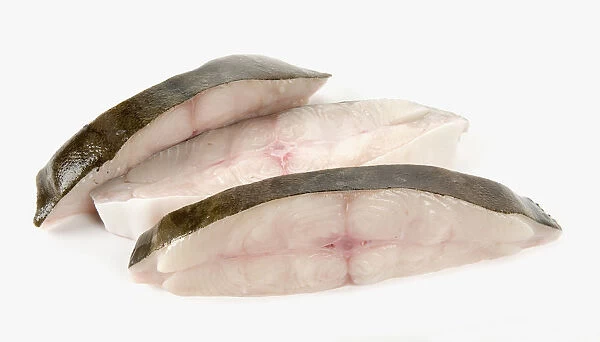 Close-up of halibut fillet and ruler with text beside it