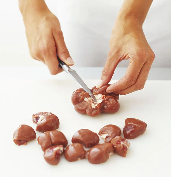 Cutting kidney into bite-sized pieces