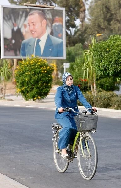 Cyclist and portrait of king Mohammed VI