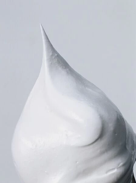 Dollop of whipped cream, close up