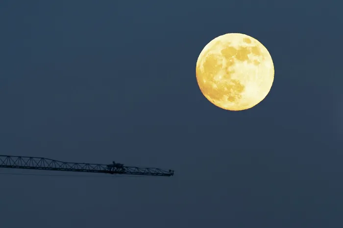 Framed Print : Moon and Crane Print, a photograph of a crane in the Lombardy region