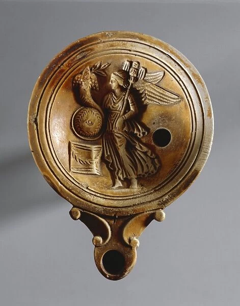 Fictile oil lamp with relief depicting goddess Fortuna. From Tomb Rebato 41, nearby Este