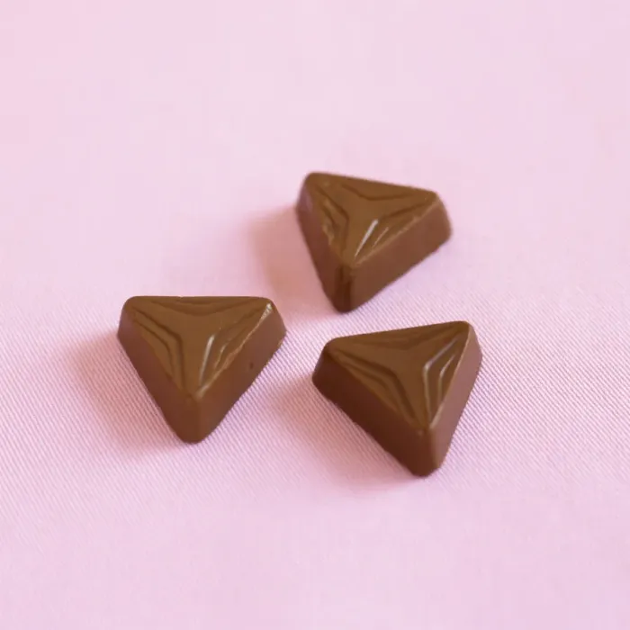 Framed Print : Three Triangular Shaped Chocolates Print Framed Print : Three Triangular Shaped Chocolates Print