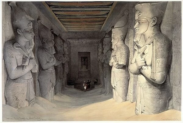 Giant limestone statues of Ramses II (Rameses - 1304-1237 BC) holding the crook and the flail