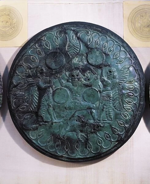 Greece, Crete, Monte Ida, Votive bronze disc depicting Zeus between two curet