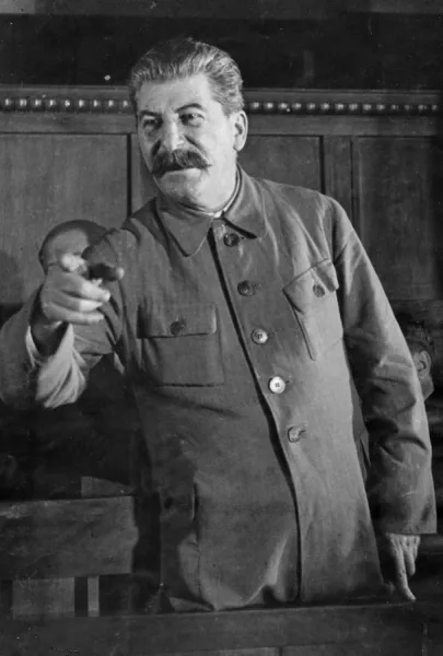 Joseph stalin giving a speach at a session of the commission for studying the project of the model constitution of agricultural artels during the second all-union congress of collective farm shock-workers, april 1935