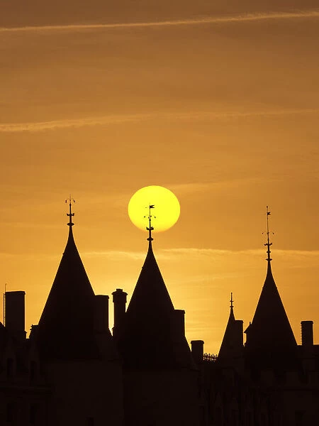 Luminescent sunset over the rooftops of Paris