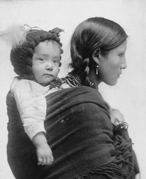 Native American woman from the Plains region, half-length portrait, facing right