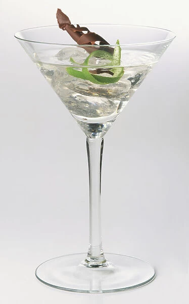 Nureyev, a vodka cocktail served in classic martini cocktail glass decorated with lime and chocolate shavings