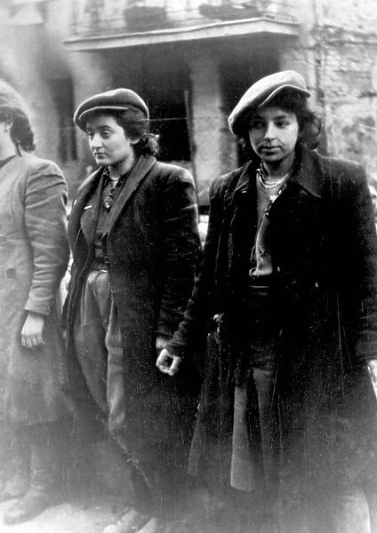 Photo from Jurgen Stroop Report to Heinrich Himmler 1943. Jewish women captured with weapons