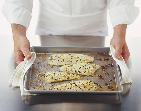 Four pieces of baked plaice fillets