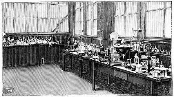 Part of Pierre and Marie Curies laboratory, Paris. Engraving published 1904