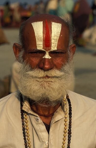 Pilgrim with Vishnu mark on his forehead at Ganga Sagar Mela