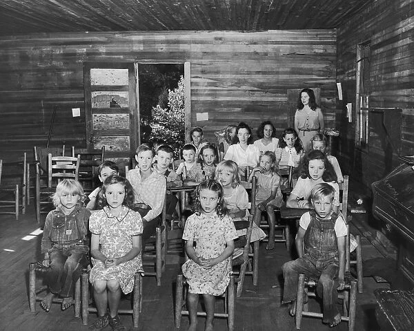 Pupils and teacher in one-room schoolhouse, Kentucky