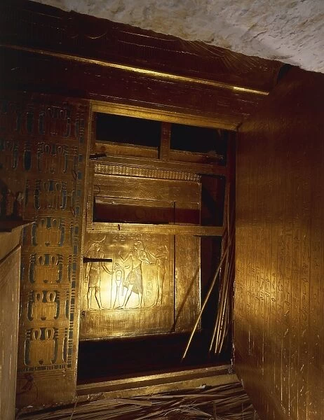 Replica of gilded wooden catafalque containing mummy, from King Tutankhamens tomb