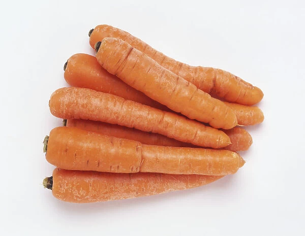 Seven stacked carrots, close up