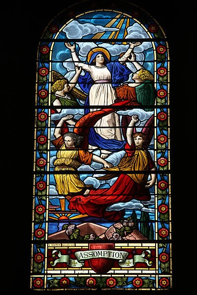Stained glass depicting Marys Assumption